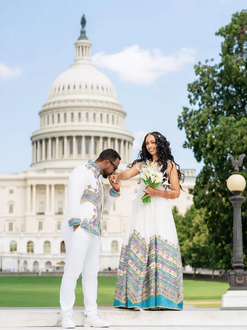 Couple in formal attire standing in front of the U.S. Capitol building. Ethiopian Wedding Attire for Couples Habesha Traditional Matching Set Ethgebya