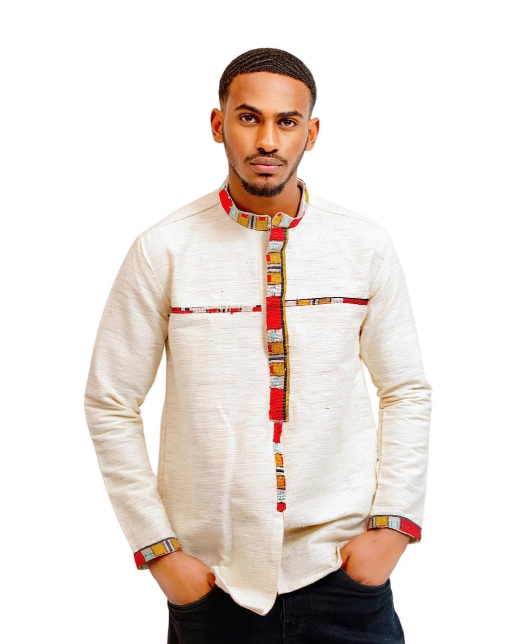 Man wearing a traditional outfit with a white shirt and colorful patterns on a white background Modern Men’s Tilf Shirt New Stylish Ethiopian Traditional Wear ethgebya gebeya habesha 