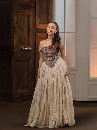 Woman in a two-tone dress standing in a room with wooden and glass Modern Brown & Beige Habesha Kemis ethgebyadoors.