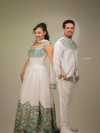Two people in traditional attire standing against a plain background Habesha Matching Wedding & Cultural Set Ethgebya