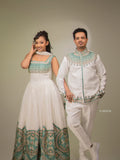 Two individuals in traditional attire standing against a plain background. Habesha Matching Wedding & Cultural Set Ethgebya