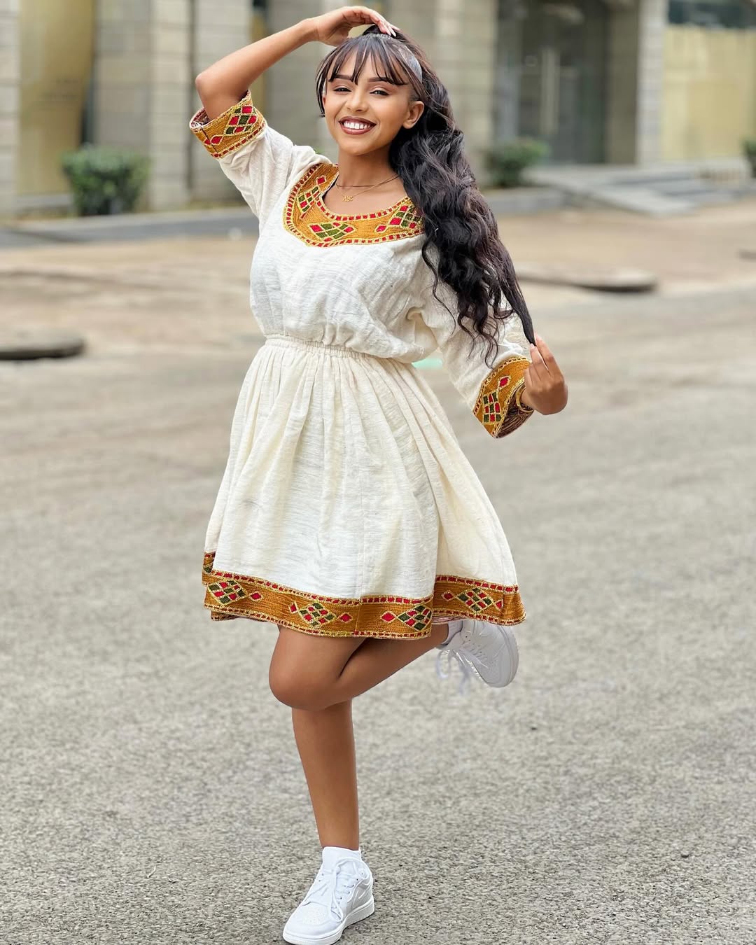 Woman in a traditional outfit with white sneakers standing outdoors. modern ethiopian dress
habesha traditional dress
habesha dress online shopping
ethiopian habesha kemis
ethiopian kemis
habesha libs
ethiopian new dress
habesha attire
fashion ethiopian dress
ethiopian women's dress
women's ethiopian clothing
modern ethiopian traditional clothes
habesha cultural dress
habesha traditional cloth
new ethiopian traditional dress
ethiopian traditional dress new
new ethiopian traditional clothes
ethiopian new fas