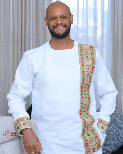 Man wearing a traditional outfit with a colorful sash indoors Golden Modern Habesha Men’s Shirt Ethiopian Traditional Clothing ethgebya gebya 