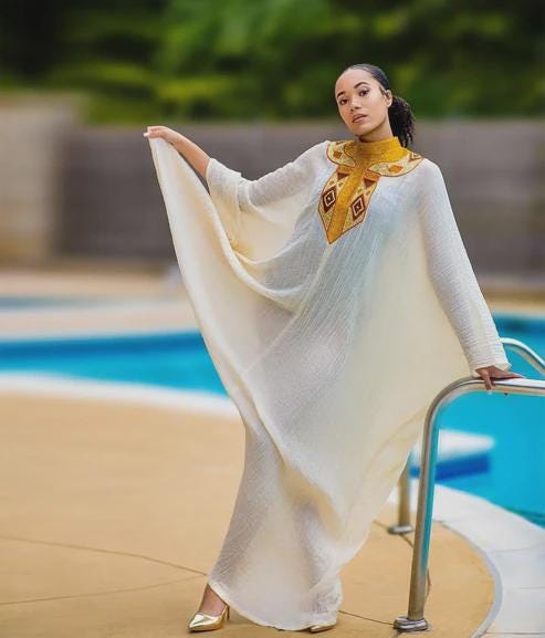 Golden Tilet Neck Ethiopian Dress: Lightweight Traditional Habesha Kemis, Free-Size Handwoven Cultural Outfit for Weddings & Celebrations
