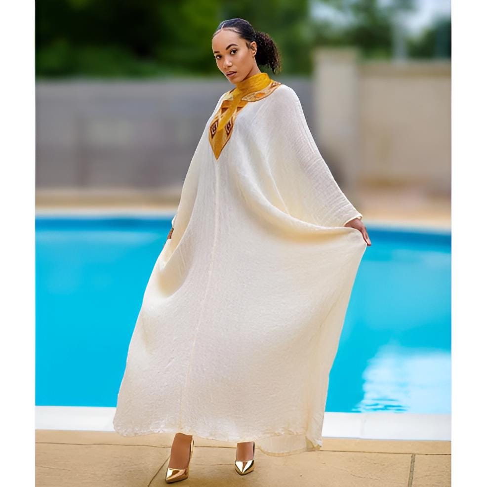 Golden Tilet Neck Ethiopian Dress: Lightweight Traditional Habesha Kemis, Free-Size Handwoven Cultural Outfit for Weddings & Celebrations