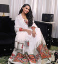 New Habesha Kemis Style | Modern Ethiopian Zuria with Tilf Embroidery - EthGebya