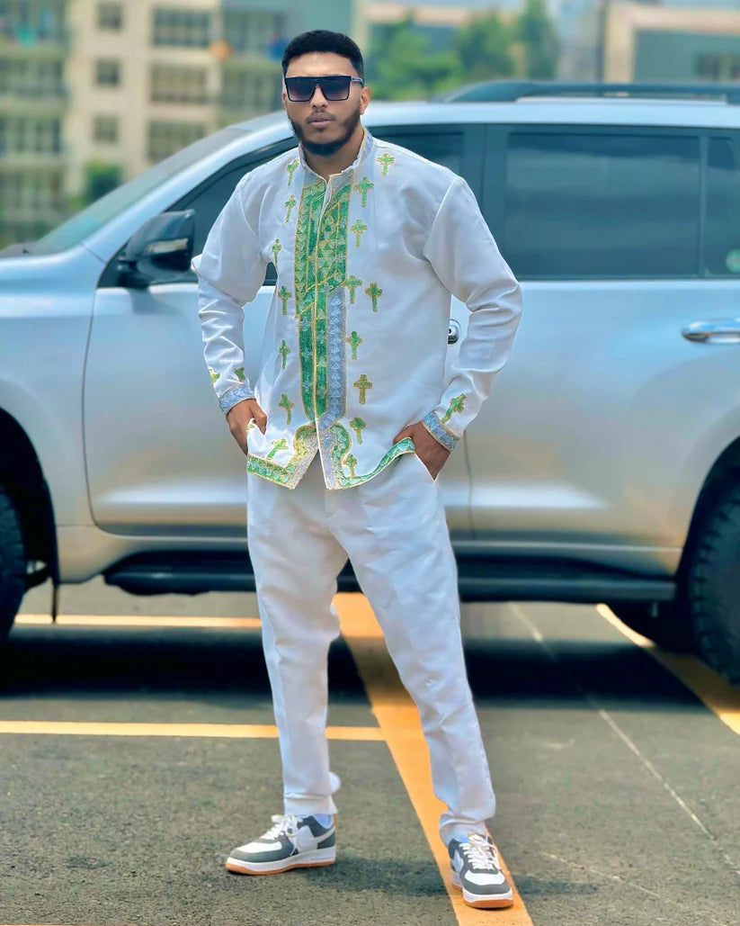 Man in a stylish outfit standing in front of a car. Shop Now & Enjoy Free Worldwide Shipping – Fast Delivery to USA, Canada, UK, and Europe! ethgebya