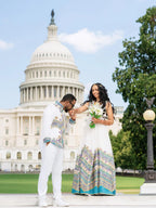 Couple in formal attire standing in front of the U.S. Capitol building. Ethiopian Wedding Attire for Couples Habesha Traditional Matching Set Ethgebya